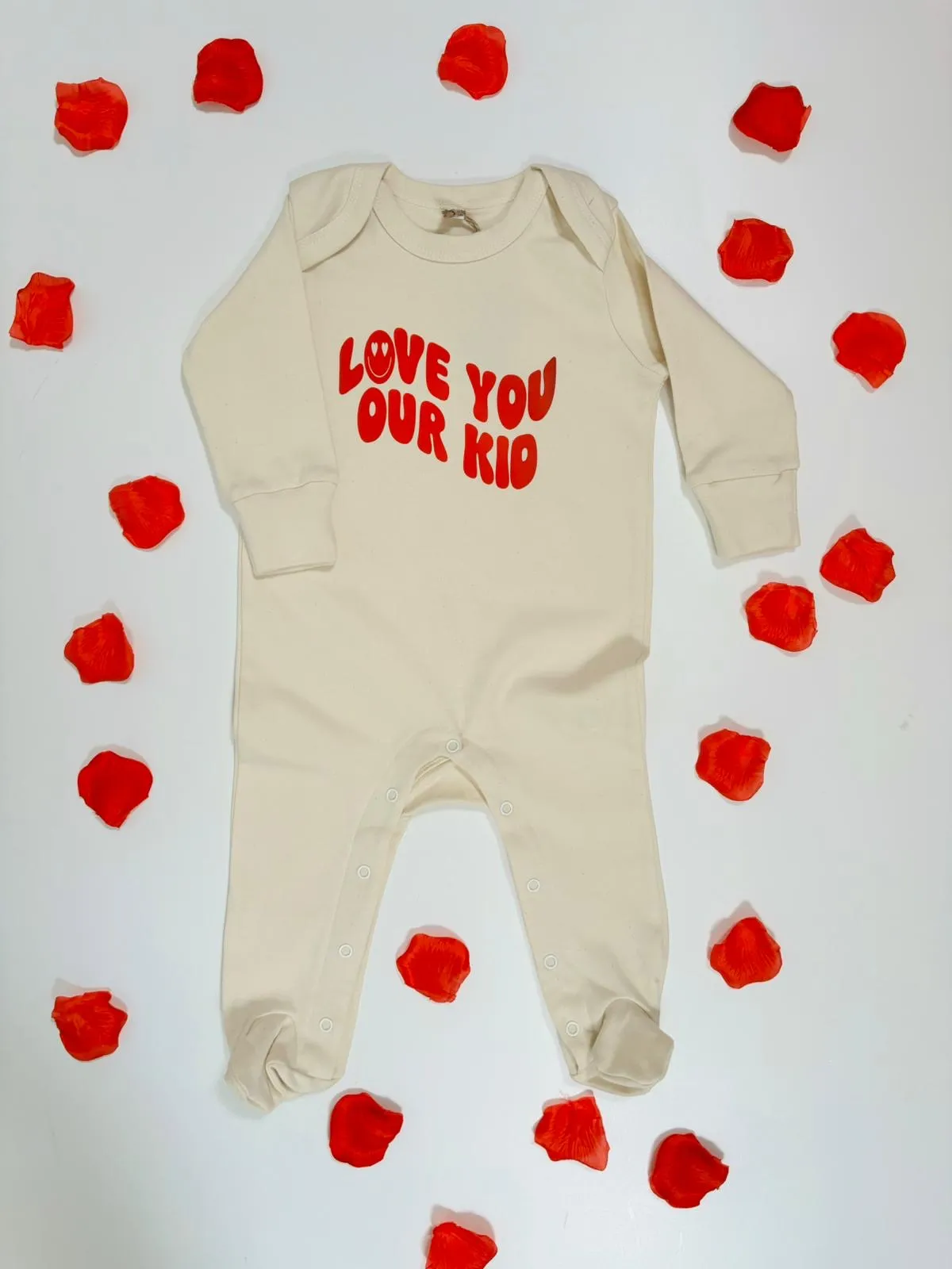 Our Albie ‘Love You Our Kid’ sleepsuit for babies organic cream